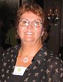 Kathy Broussard wearing a black top